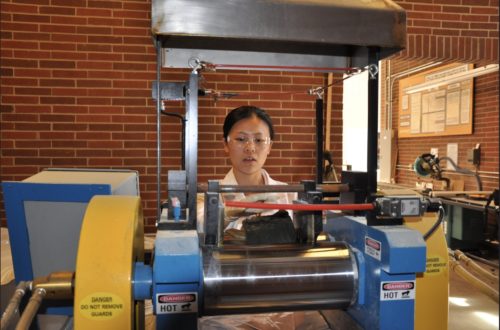 OSU doctoral student Wen Bai develops rubber composites in an OSU laboratory